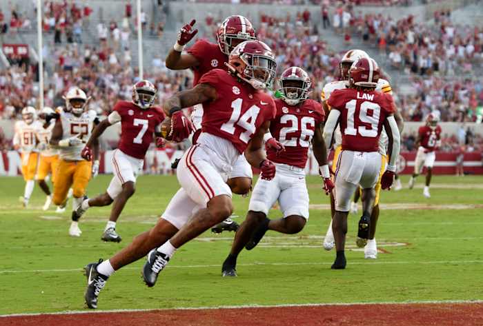 Alabama Crimson Tide defensive back Brian Branch returns a punt for a touchdown against the UL Monroe Warhawks at Bryant-Denny Stadium. Alabama won 63-7.
